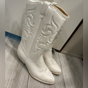 White cowgirl boots.
